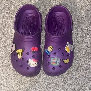 gently used purple crocs size 5